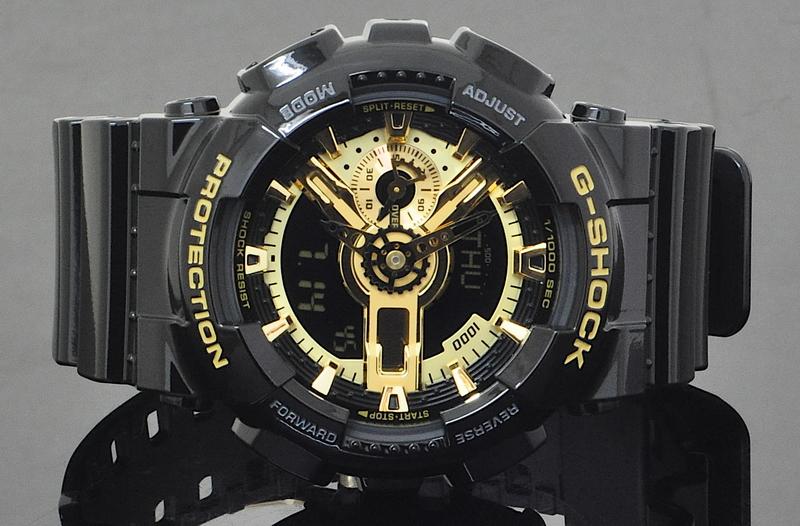 đồng hồ nam: G-shock màu đen chi tiết vàng.