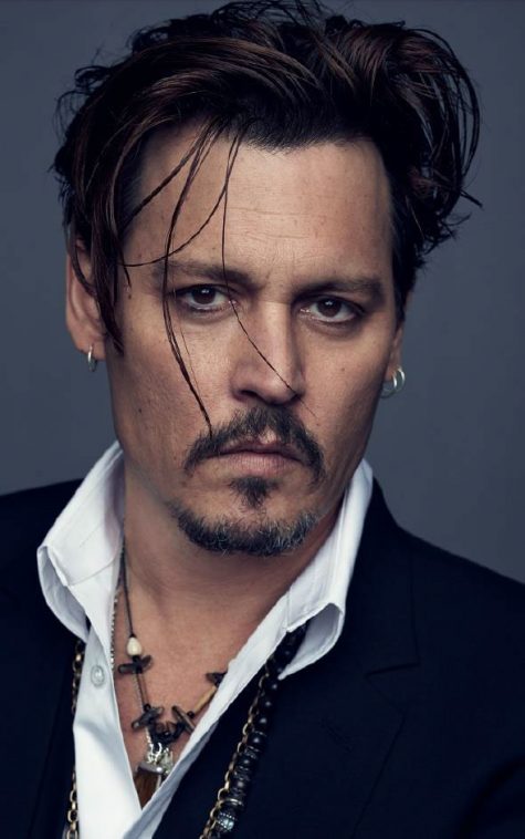 Tài tử Johnny Depp bị kiện bởi hai vệ sĩ cũ của mình.