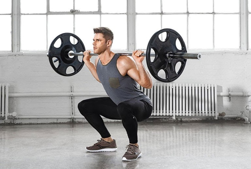 Kegel squats với tạ